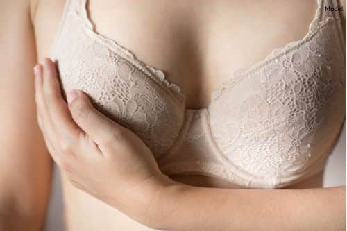 https://www.wilsonplasticsurgery.com/wp-content/uploads/2019/10/woman-touching-breast-with-beige-bra-img-blog-compressor.jpg